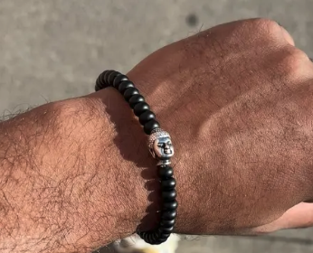 Black lava stone stretch bracelet with Buddha head